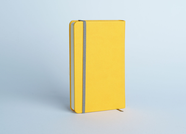 دفترچه یادداشت 96 برگ خط دار مدل مانا آراد | طرح زرد 1 بوک کلاب ایران 1